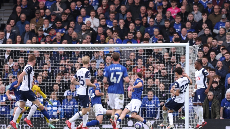 Brennan Johnson (second right) drilling home Tottenham's opener