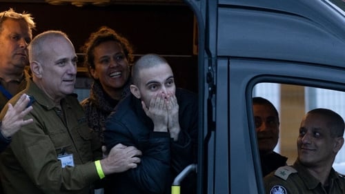 Omer Wenkert thanks supporters after landing at Beilinson hospital following his release from captivity