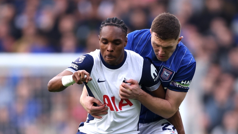 Mathys Tel in action for Spurs last season against Ipswich and Republic of Ireland defender Dara O'Shea