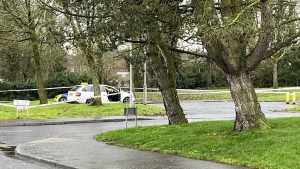 A man was shot twice as he sat in his taxi in the Dunmurry area of Belfast yesterday