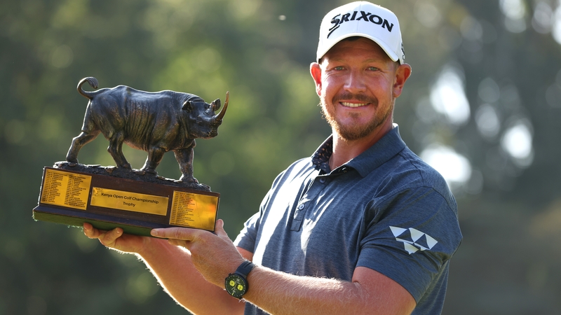 Jacques Kruyswijk celebrates victory with the trophy