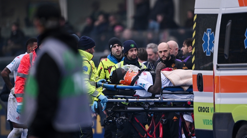 Moise Kean is stretchered to an ambulance at Stadio Marcantonio Bentegodi