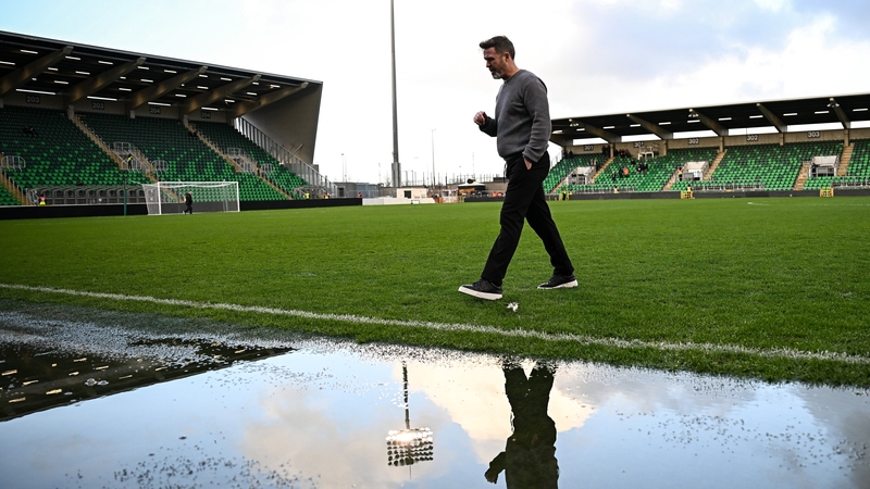 Shamrock Rovers manager Stephen Bradley walking on the pitch earlier in the day before the postponement