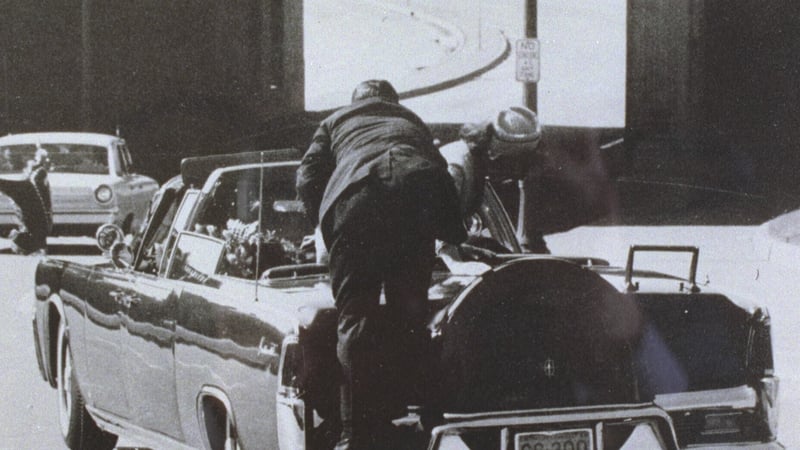 Clint Hill jumped onto the limousine in the moments after John F Kennedy was shot