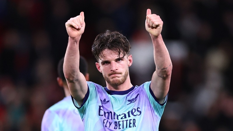 Declan Rice acknowledges the away supporters after Arsenal's draw at the City Ground