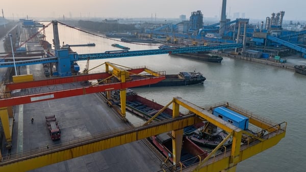 Cargo ships load and unload goods at a canal steel terminal in Huai 'an, Jiangsu province, China (file pic)