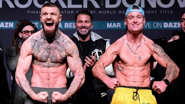Lewis Crocker and Paddy Donovan pose for pictures following the pre-fight weigh-in
