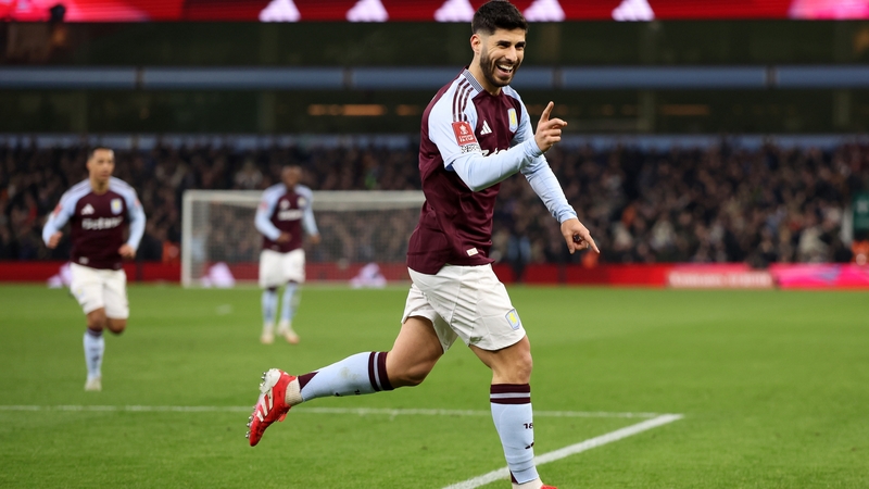 Aston Villa's Marco Asensio celebrates the first of his two goals against Cardiff City