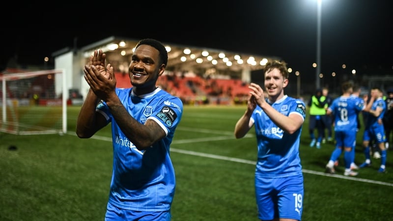 Waterford's Navajo Bakboord and Sam Glenfield celebrate victory at the full-time whistle