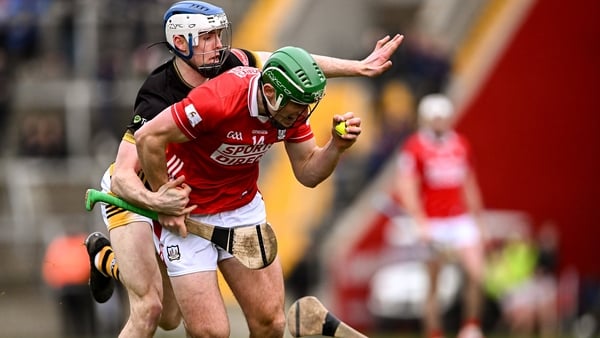 Robbie O'Flynn of Cork in action against Huw Lawlor
