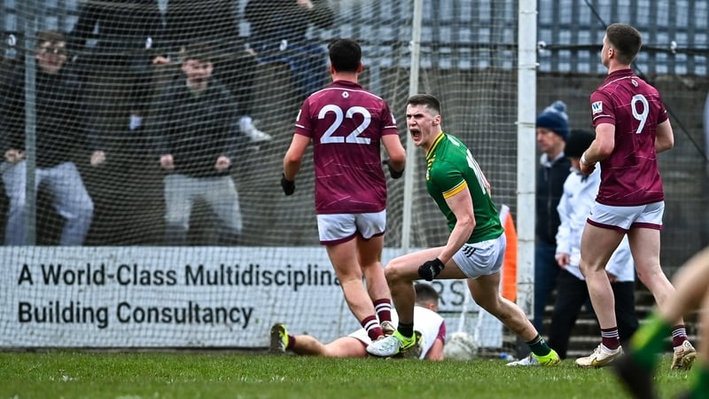 Conor Duke wheels away in celebration after scoring his side's winning goal