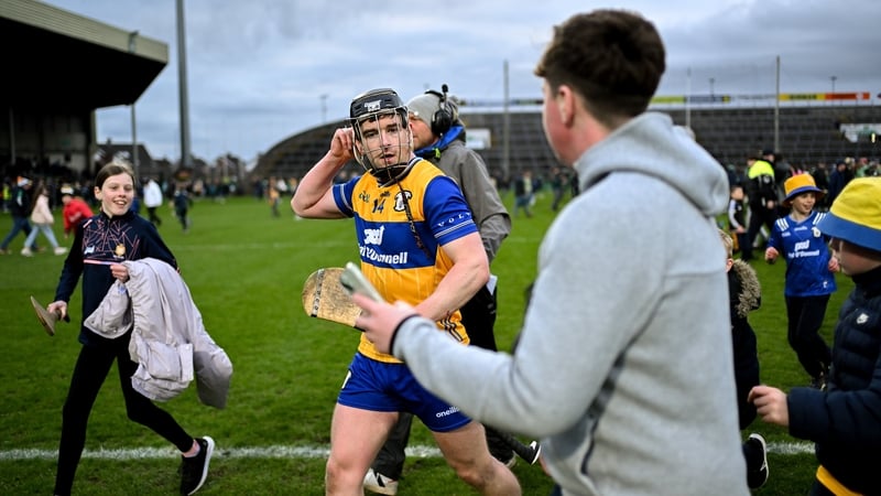 Autograph hunters seek out Tony Kelly after the full-time whistle