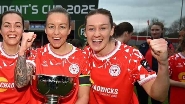 Pearl Slattery and Rachel Graham celebrate with the FAI President's Cup after Saturday's 2-1 win over league champions Athlone Town