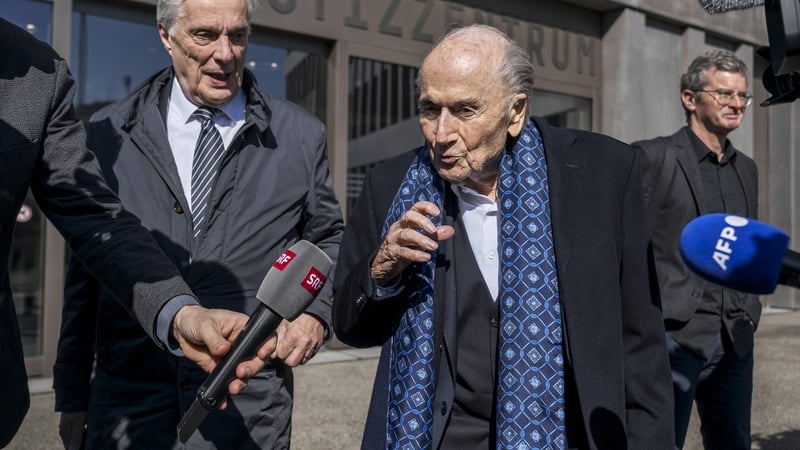Sepp Blatter speaking to reporters outside the Swiss court
