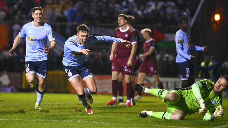 Evan Caffrey wheels away after opening the scoring for Shelbourne
