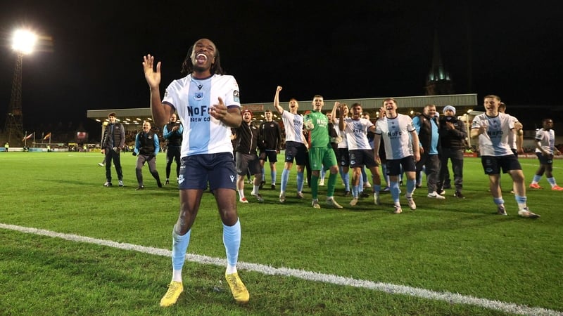 Thomas Oluwa celebrates after the full-time whistle at Dalymount Park