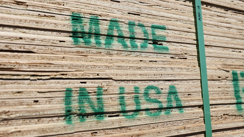 Stacks of US lumber are stamped 'Made In USA' at a Home Depot in Pasadena, California