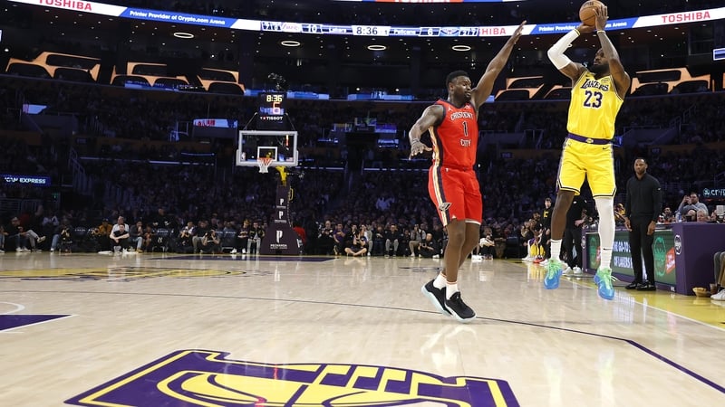 LeBron James landing a three-point basket to break the 50k mark