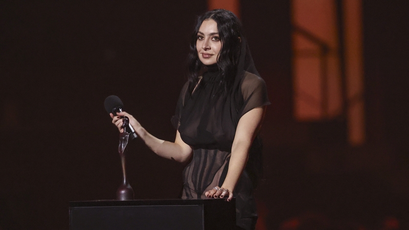 The big winner of the night, Charli XCX, wore a black, see-through dress