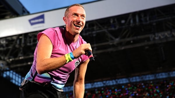 'There's some people on the pitch . . . They think it's Chris Martin . . . It is now!'