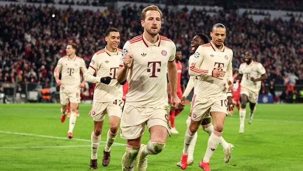 Harry Kane celebrates after scoring Bayern Munich's third goal against Bayer Leverkusen