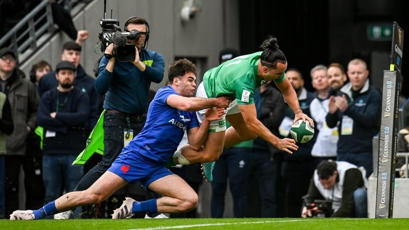 James Lowe evades the clutches of Damian Penaud to score in the 2023 Six Nations clash in Dublin