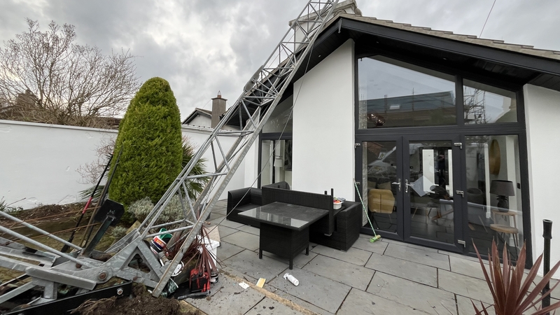 The crane came down in the back garden of a house in the Emmet Terrace area