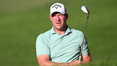 Shaun Norris plays his approach shot on the 17th hole on day three
