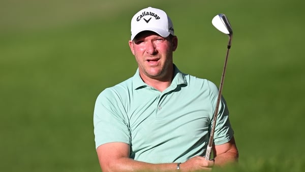 Shaun Norris plays his approach shot on the 17th hole on day three