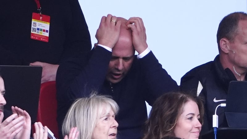 Arne Slot was a frustrated figure as he watched the first half from the stands