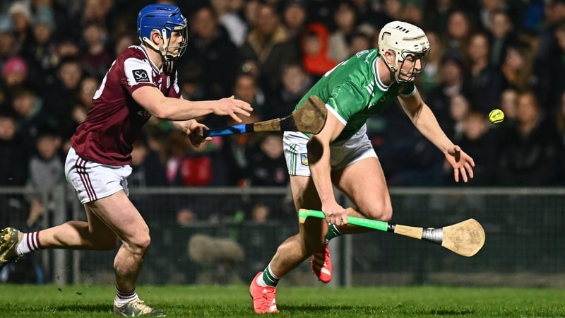 Limerick's Kyle Hayes is pursued by Anthony Burns of Galway