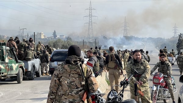 The new Syrian government's army dispatched reinforcement units consisting of hundreds of vehicles to Latakia