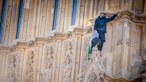 A man holding a Palestinian flag climbed the Big Ben, Elizabeth Tower in London