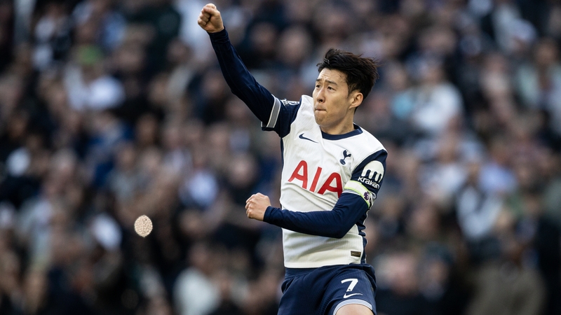 Son Heung-Min celebrates converting his spot-kick for Tottenham's equaliser