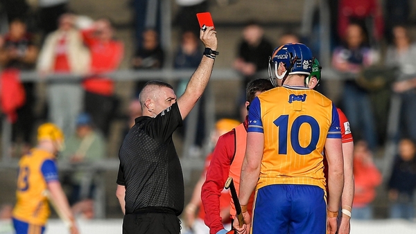 Referee Liam Gordon sends Clare's David Fitzgerald off