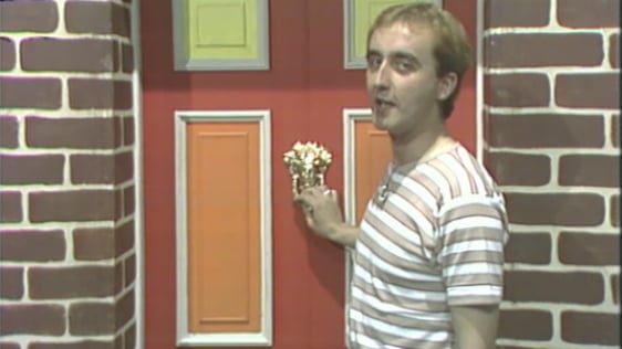 'Bosco' presenter Frank Twomey knocks on the Magic Door, 1990.