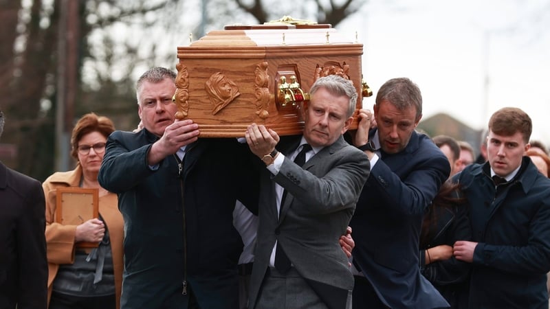 Patrick Kielty carried his mother's coffin following her funeral at the Church of the Sacred Heart in Dundrum, Co Down