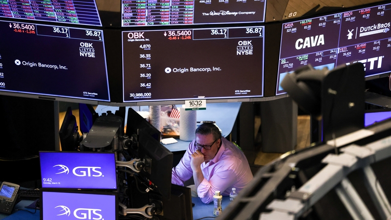 A trader works on the floor of the New York Stock Exchange