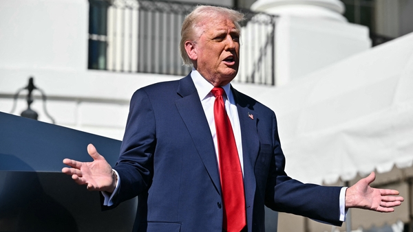 President Donald Trump shook off market gyrations, telling reporters that markets would go up and down, but he had to rebuild the economy