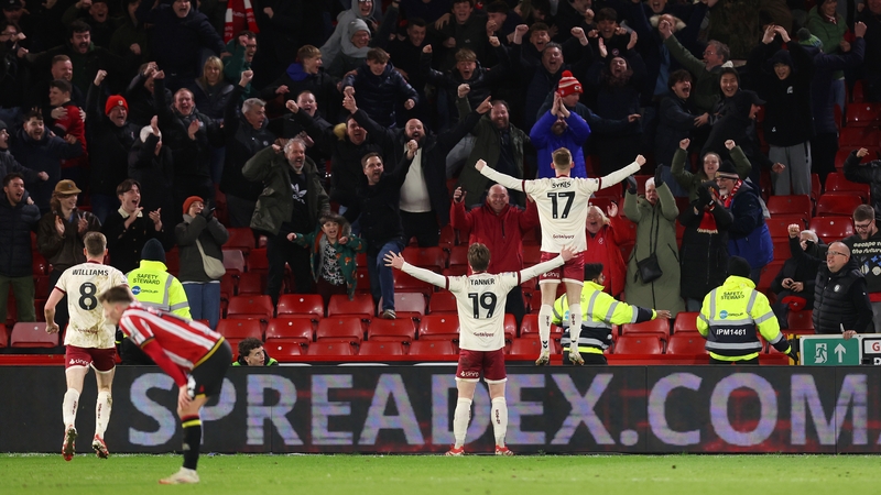 Mark Sykes celebrates his equaliser at the death at Bramall Lane