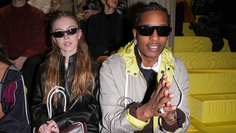 Sydney Sweeney, left, and A$AP Rocky attend the Miu Miu Fall/Winter 2025-2026 Womenswear collection presented Tuesday, March 11, 2025 in Paris. (Photo by Scott A Garfitt/Invision/AP)