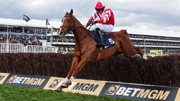 Lecky Watson, with Sean O'Keeffe up, jumps the last on their way to winning The Brown Advisory Novices' Steeple Chase