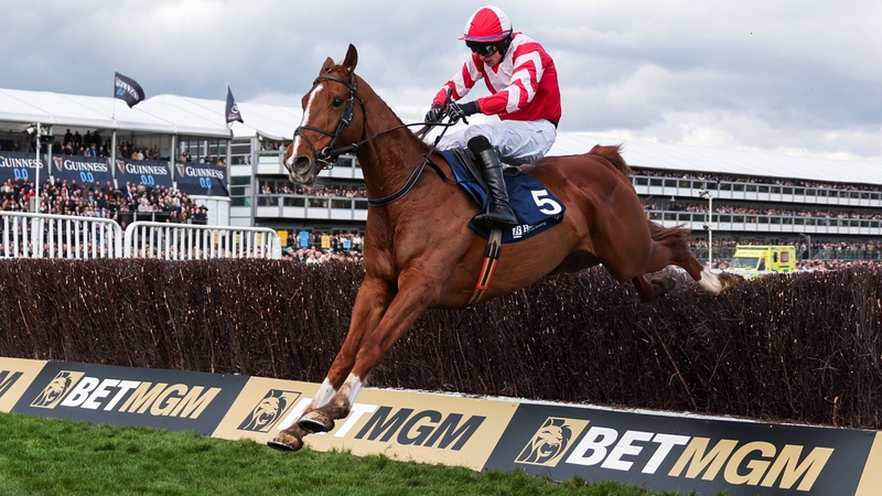 Lecky Watson, with Sean O'Keeffe up, jumps the last on their way to winning The Brown Advisory Novices' Steeple Chase