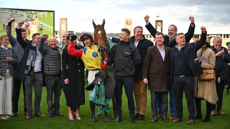 Jockey Danny Gilligan celebrates with connections after winning The Debenhams Johnny Henderson Grand Annual Handicap Steeple Chase Challenge Cup with Jazzy Matty