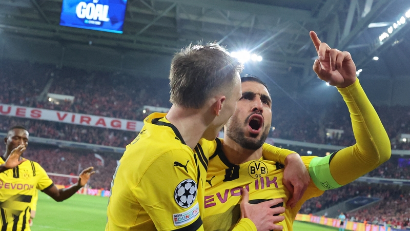 Emre Can celebrates after equalising for the Bundesliga side