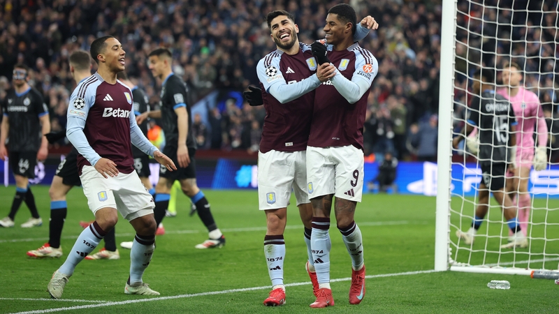 Marco Asensio celebrates scoring Aston Villa's third goal with team-mate Marcus Rashford