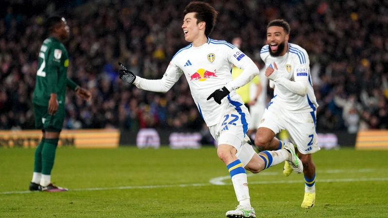 Leeds United's Ao Tanaka (L) celebrates after scoring his side's second goal