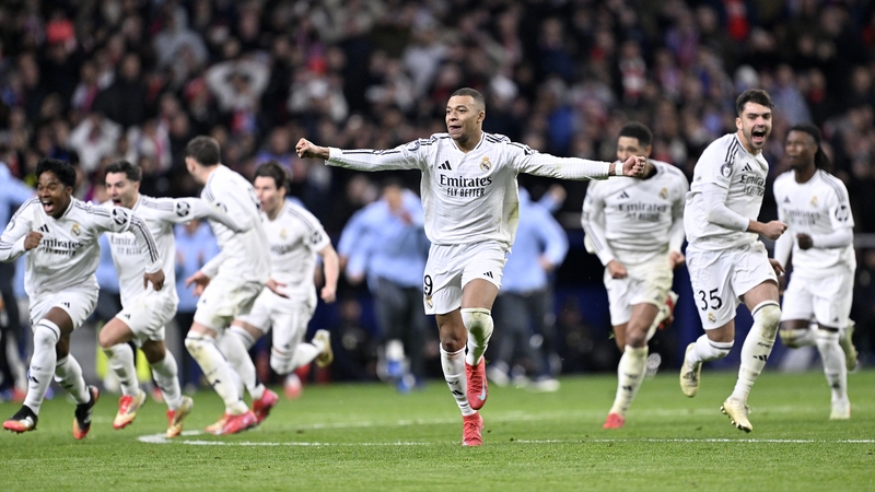 Real Madrid celebrate their victory at the home of their city rivals