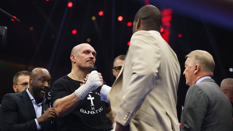 Oleksandr Usyk shakes hands with Daniel Dubois in the ring following his victory over Tyson Fury in December