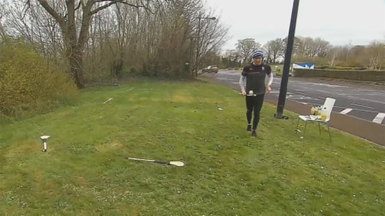 Fundraising Mayo hurler Cathal Freeman runs a lap around his garden while soloing a sliotar, 2020